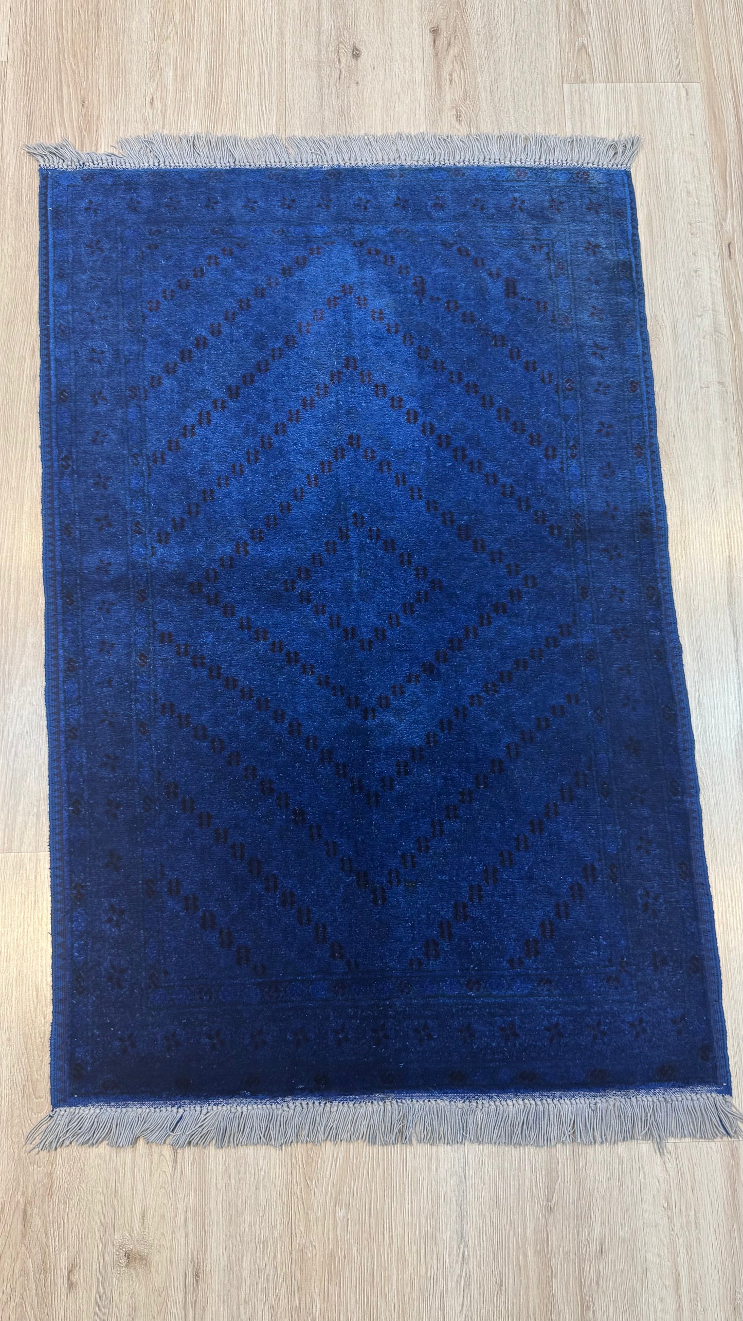 Silk Rug. Blue Mark of Grace.