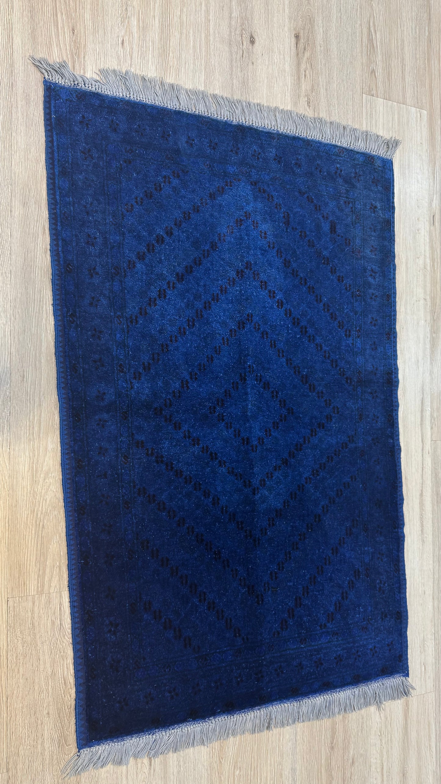 Silk Rug. Blue Mark of Grace.