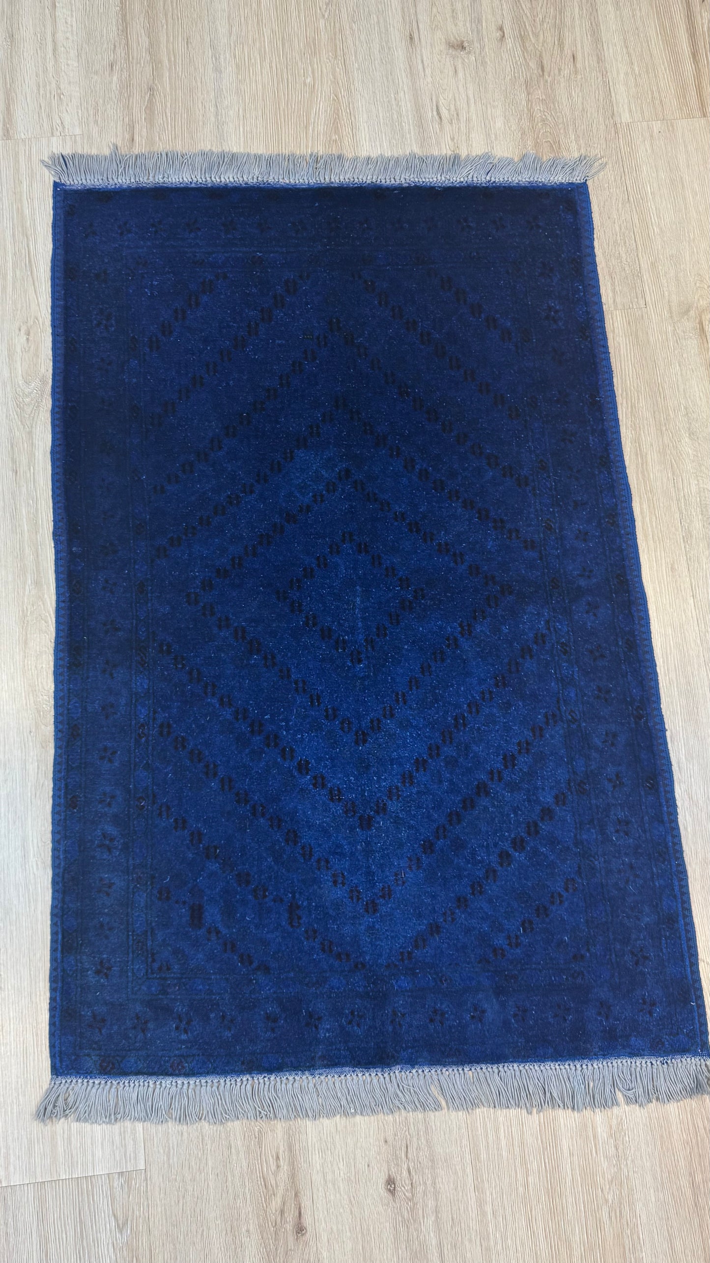Silk Rug. Blue Mark of Grace.